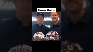 Kimi gives Vettel a fake Helmet