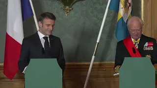 President Macron of France on state visit to Sweden, inspecting the guards with King Carl XVI Gustaf