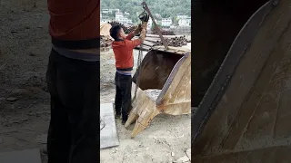Repair and Reinforcement of Excavator Bucket Bottom Plate.
