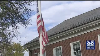 When does the U.S. flag fly at half-staff?