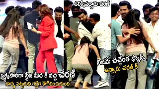 A Lady Fan Suddenly Came To Stage And Touches The Ram Charan Feet And Hugs Him | Jr Ntr | TCB