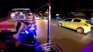 Ferrari is overtaken by a tuk-tuk