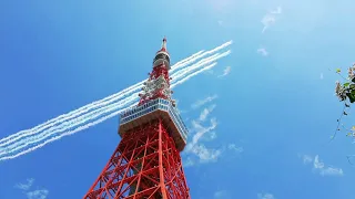 Aerobatic Aircraft Team Flies Past Tokyo Tower to Mark Start of Olympic Games