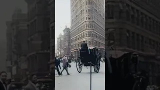 Restored Footage of New York City in 1911 - Vehicles and pedestrians pass by the Flatiron building