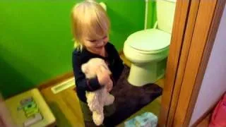 Lucy potty-training Tickles the Bear