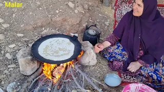 Mother with her sister making local bread