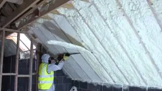 Spray Foam of attic and then Foam being cut evenly