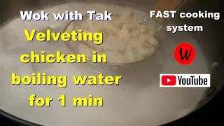 Wok with Tak.  Velveting chicken in boiling water for 1 min.