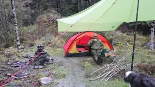 CAMPING in the RAIN - freezing cold - fire pit - tent