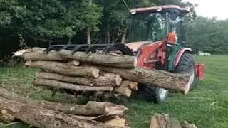Grannet Grapple On The RK 37 Tractor For Firewood Production