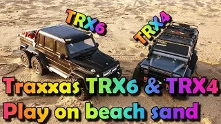 Rc car Traxxas trx6 and trx4 play on beach sand