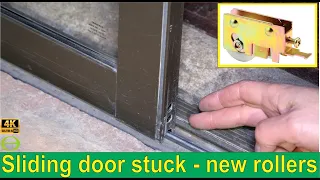 Sliding door stuck? How to replace the rollers.