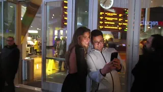 Kara Del Toro poses for photos with very happy fans outside the ArcLight Hollywood