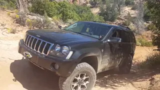 Jeep Grand Cherokee WK wheeling up hog canyon, Southern Utah.