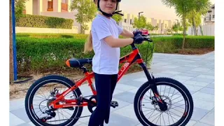 Diana and Roma with their bicycles