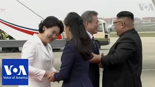 Kim Welcomes Moon at Pyongyang Airport