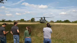 RAF Chinook landing and take-off from field