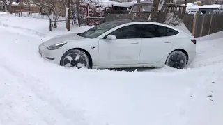 Tesla Model 3 Performance plowing snow