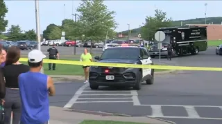 Security guard shot, wounded breaking up a fight outside a high school football game