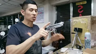 Testing the WE Beretta M92 Silver Airsoft gas blowback pistol before shipping.