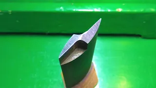 Drill bit for drilling triangular holes