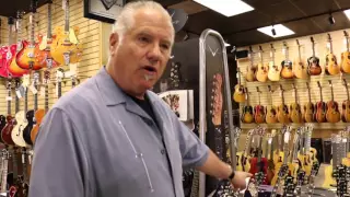 Norm giving a tour of his store Norman's Rare Guitars