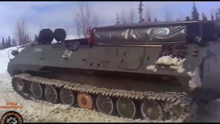 Вездеход мтлб застрял в грязи на бездорожье севере России Russian tank stuck in the mud