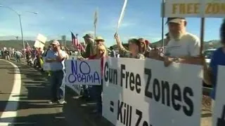 President Obama greeted by protests in Oregon