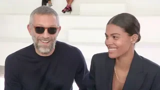 Newly wed Vincent Cassel and Tina Kunakey front row for the Roberto Cavalli Show