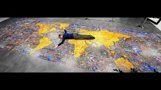 Dowdle 60000-piece What a Wonderful World, world's largest jigsaw puzzle (I 2023) hanged on the wall