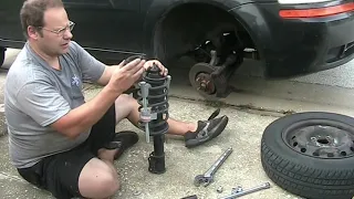 2006 Chevy Aveo strut bushing installed the correct way