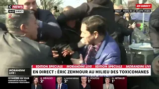 Protester throws water bottle at French presidential candidate Eric Zemmour
