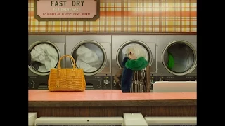 THE LAUNDROMAT, Prada 'The Postman Dreams'