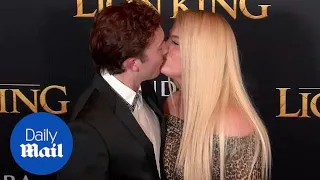 Meghan Trainor and Daryl Sabara kiss on 'Lion King' red carpet