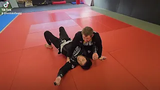 Side control escape to Shin on belly choke