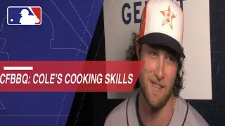 Cole gives some cooking tips to Cespedes Family BBQ