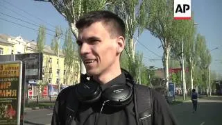 People at barricades in Donetsk, police checkpoint in Slovyansk