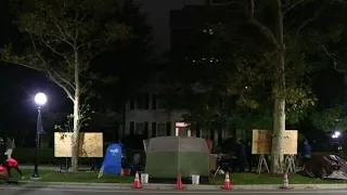 University of Michigan president addresses protest outside home