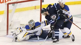 Jordan Binnington stretches out for terrific save to secure Blues' Game 1 win