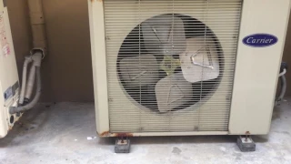 (Shown turned on and off) Carrier brand air conditioners (OUTDOOR CONDENSER UNITS)