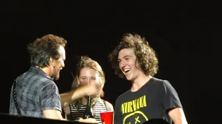 Pearl Jam - Eddie Vedder brings a young couple up onto the stage and hands them a bottle of wine :)