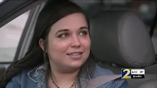 CAUGHT ON CAMERA: Officers rescue baby from backseat of car stolen in carjacking