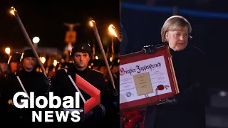 German Chancellor Angela Merkel receives military sendoff as days in power near end