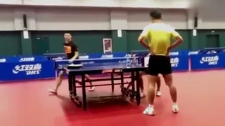 Ma Long and Zhou Qihao trying Zhang Jike's challenge trick shot so funny