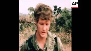 SYND 18 5 78 RHODESIAN TROOPS TRACKING GUERRILLAS IN COUNTRYSIDE