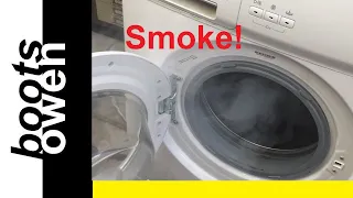 Essentials washing machine smoking: will it go on fire? Burning rubber! Door seal and broken spider