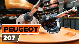 How to change a front shock strut on PEUGEOT 207 [TUTORIAL AUTODOC]