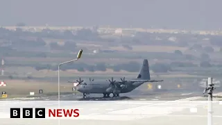 Sudan evacuation plane fired on as it lands at airbase - BBC News