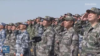 China's PLA stages march-past for Army Day parade