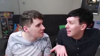 dan almost kissing phil on camera